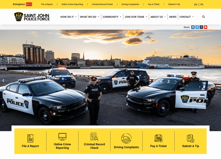 A Saint John Police Force website with a yellow background.